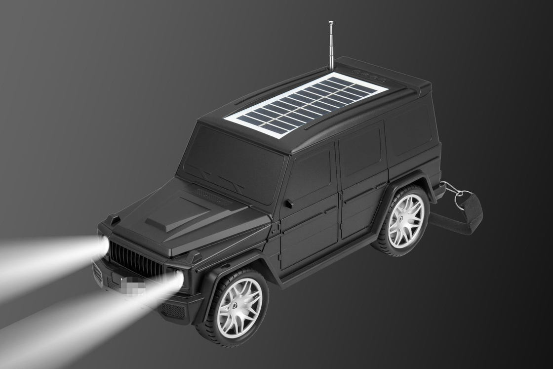Le haut-parleur Bluetooth classique en forme de voiture combine une lampe de poche solaire et des fonctions radio pour les voyages à domicile en plein air